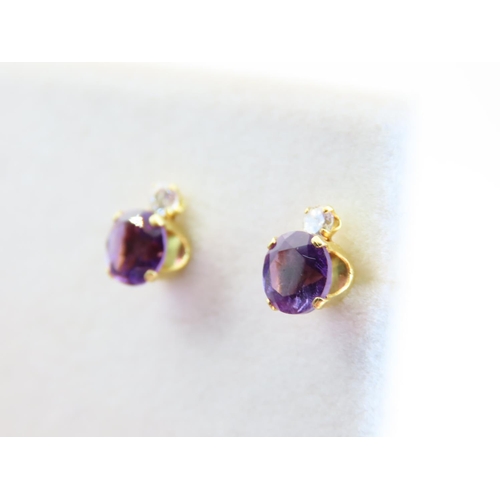 114 - Pair of Amethyst and Diamond Set 9 Carat Yellow Gold Earrings