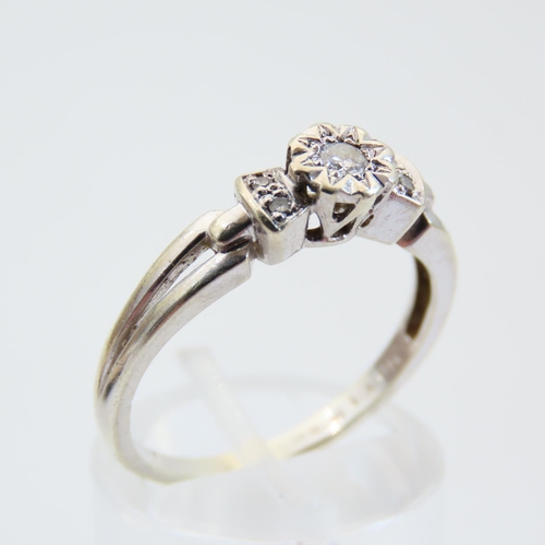 117 - Diamond Set 9 Carat White Gold Ladies Ring with Further Set Diamond Decoration to Shoulders Ring Siz... 