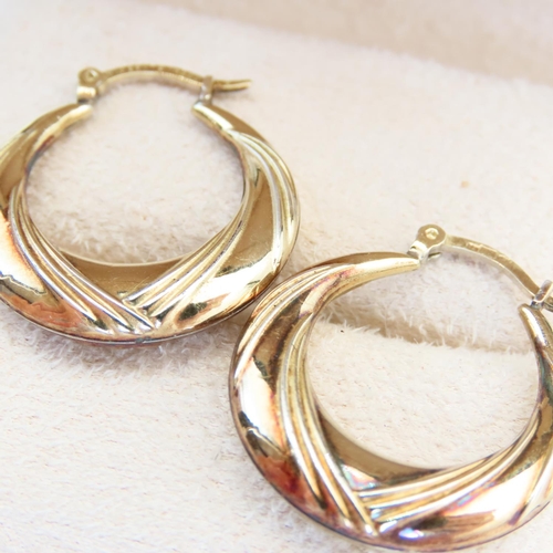 123 - Pair of 9 Carat Yellow Gold Ladies Hoop Earrings Incised Detailing Each Approximately 2cm Diameter