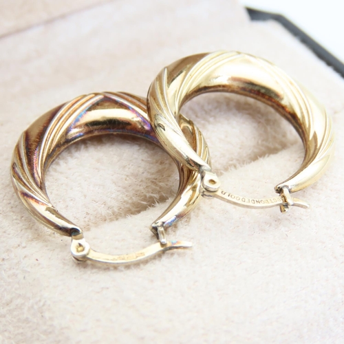 123 - Pair of 9 Carat Yellow Gold Ladies Hoop Earrings Incised Detailing Each Approximately 2cm Diameter