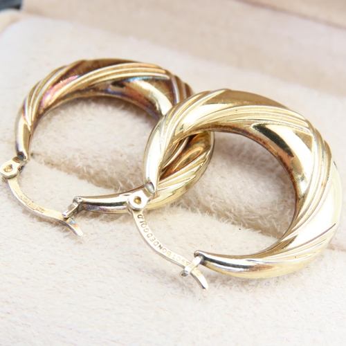 123 - Pair of 9 Carat Yellow Gold Ladies Hoop Earrings Incised Detailing Each Approximately 2cm Diameter