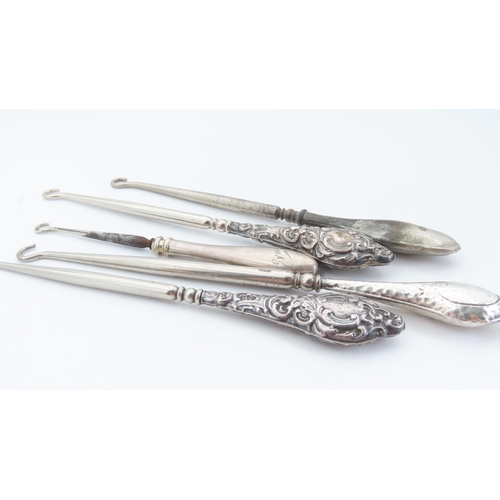 Five Silver Handled Button Hooks