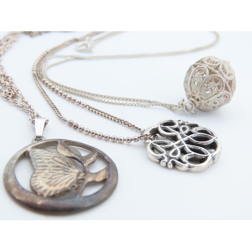 533 - Three Silver Pendant Necklaces Attractively Detailed Each Mounted on Silver Chains