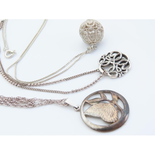 533 - Three Silver Pendant Necklaces Attractively Detailed Each Mounted on Silver Chains