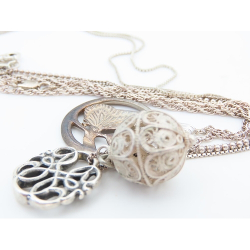 533 - Three Silver Pendant Necklaces Attractively Detailed Each Mounted on Silver Chains