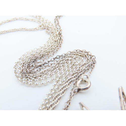 534 - Three Silver Pendant Necklaces Attractively Detailed Each Mounted on Silver Chains