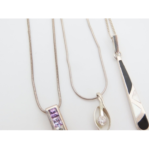 535 - Three Silver Pendant Necklaces Attractively Detailed Each Mounted on Silver Chains