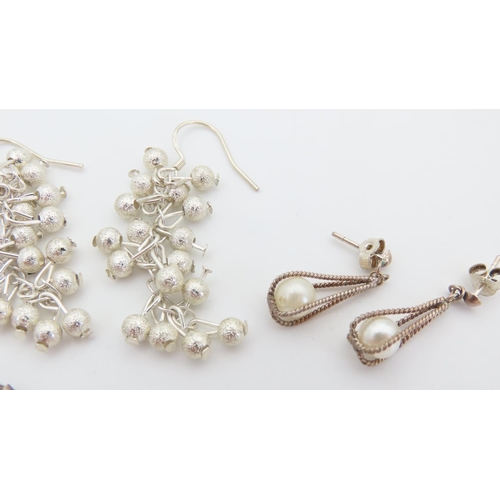 546 - Three Pairs of Silver Earrings and Aother Pearl Set Silver Mounted