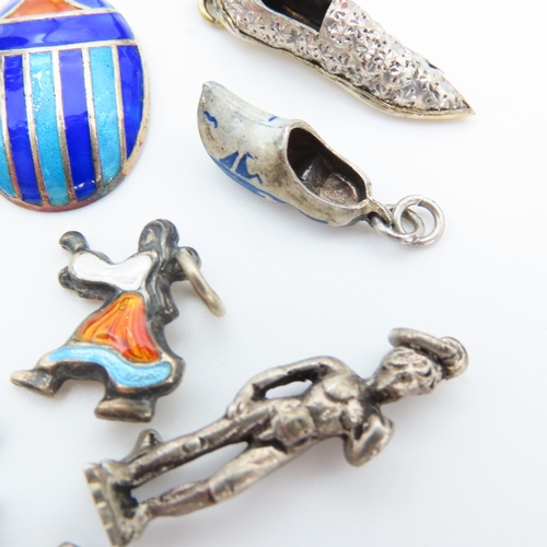 547 - Various Silver Charms Some Enamel Decorated Quantity as Photographed