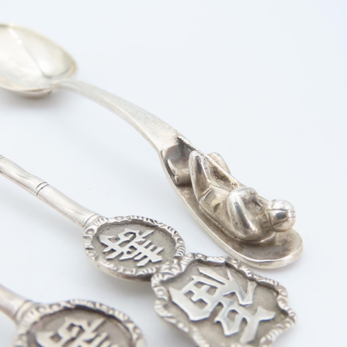 550 - Four Silver Teaspoons Including Pair of Hong Kong Silver Examples