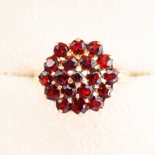 65 - Garnet Set Cluster Ring Mounted on 9 Carat Yellow Gold Band Size P