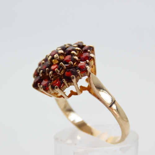 65 - Garnet Set Cluster Ring Mounted on 9 Carat Yellow Gold Band Size P