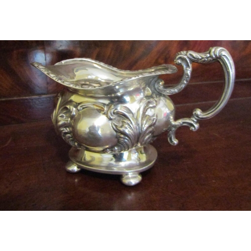 543 - Rocco Form Silver Bachelors Milk Jug Shaped Form Handle Above Bun Supports Attractively Detailed