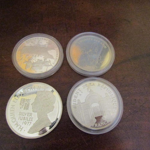 545 - Four Silver Coins Encapsulated Mint Condition