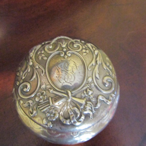 549 - Silver Desk Jar Shaped Form Embossed Detailing Attractive Motifs Approximately 3 Inches Diameter