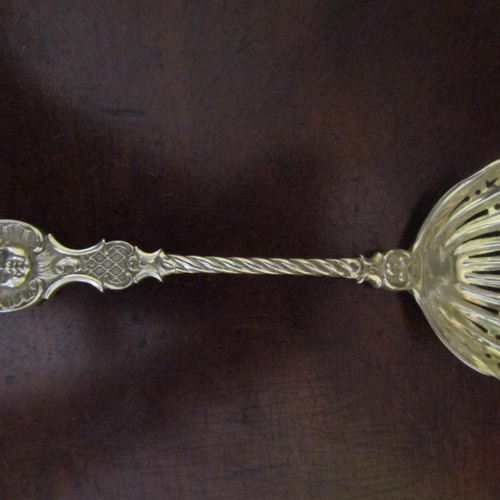 551 - Silver Sugar Caster Spoon Figural Decoration Attractively Detailed Approximately 6 Inches Long