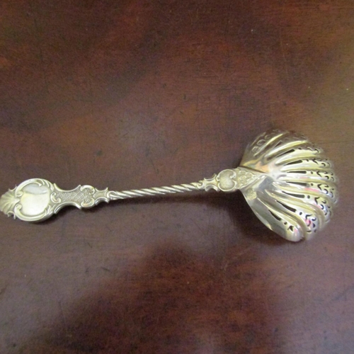 551 - Silver Sugar Caster Spoon Figural Decoration Attractively Detailed Approximately 6 Inches Long