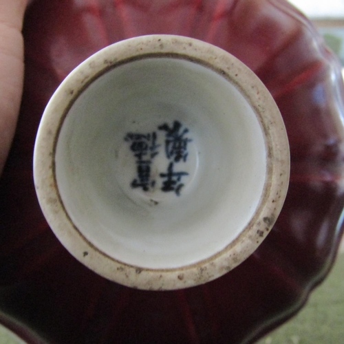 73 - Oriental Burgundy Ground Stem Cup Scallop Rim Signed with Characters to Base Approximately 6 Inches ... 