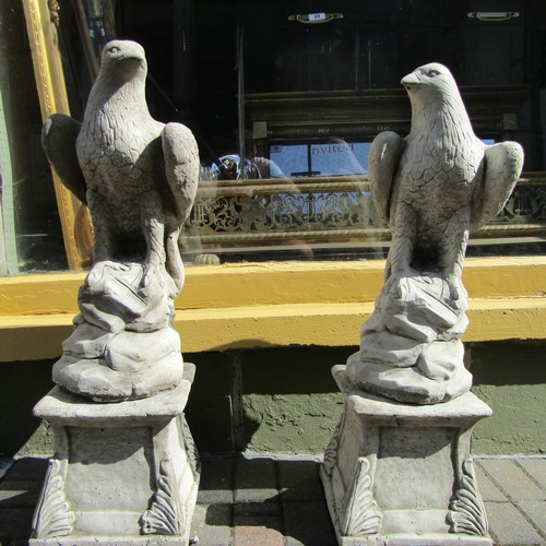 Pair of Full Size Composite Stone Eagles on Shaped Form Supports