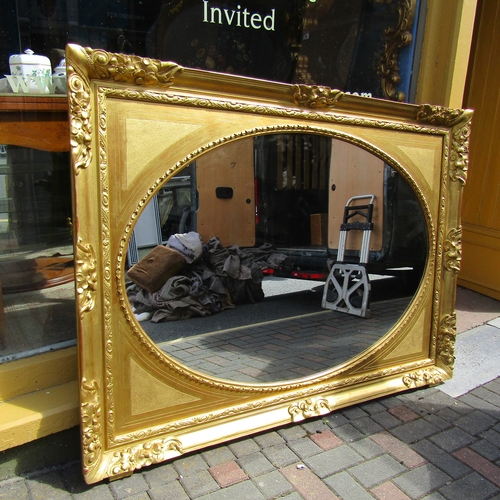 595 - Gilded Wall Mirror Inset Oval Plate Rectangular Form Approximately 5ft Wide