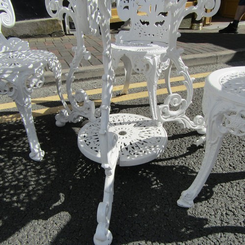 587 - Cast Metal Garden or Conservatory Table with Four Matching Chairs Table Approximately 3ft Diameter