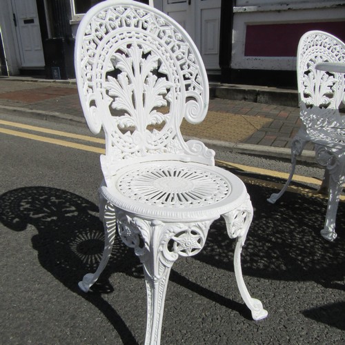 587 - Cast Metal Garden or Conservatory Table with Four Matching Chairs Table Approximately 3ft Diameter