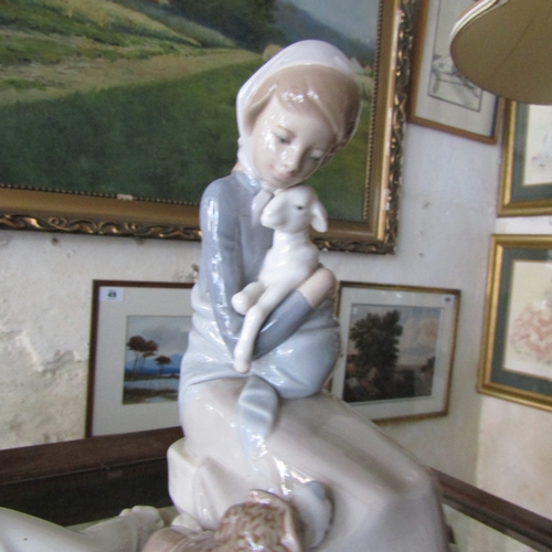 599 - Lladro and Nao Fine Porcelain Figures Two in Lot