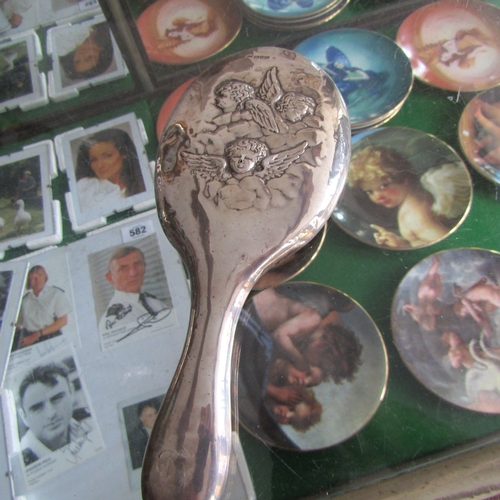 606 - Silver Mounted Dressing Table Mirror with Reynold's Angels Embossed Decoration