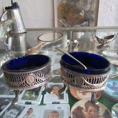 Pair of Oval Form Bristol Blue Glass Lined Silver Plated Table Salts with Silver Spoon