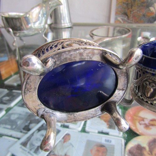 612 - Pair of Oval Form Bristol Blue Glass Lined Silver Plated Table Salts with Silver Spoon