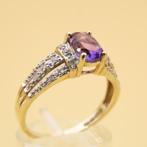 104 - Amethyst and Diamond Ring Four Claw Set 9 Carat Yellow Gold Band Ring Size R