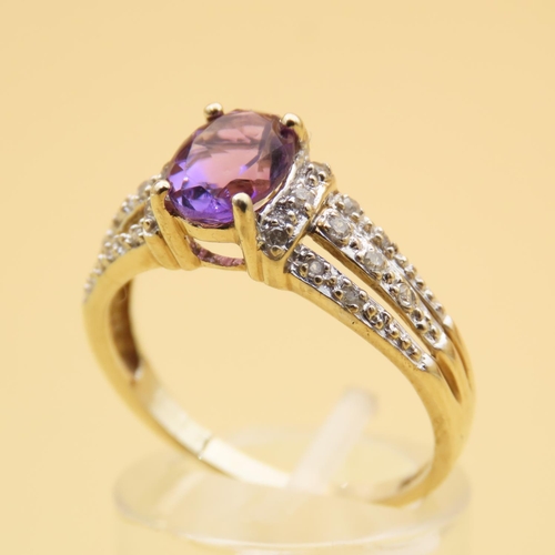 104 - Amethyst and Diamond Ring Four Claw Set 9 Carat Yellow Gold Band Ring Size R