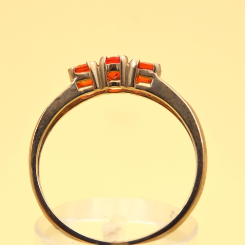 105 - Mandarin Garnet Three Stone with Diamond Mounted on 9 Carat Yellow Gold Band Ring Size R