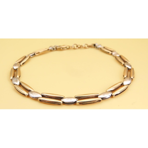 107 - 9 Carat Yellow and White Gold Ladies Bracelet Articulated Form 20cm Long