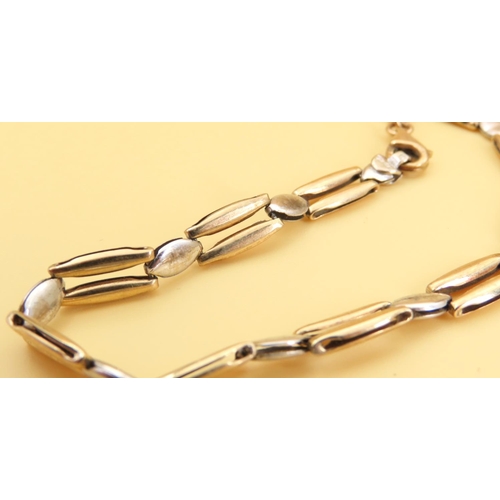 107 - 9 Carat Yellow and White Gold Ladies Bracelet Articulated Form 20cm Long