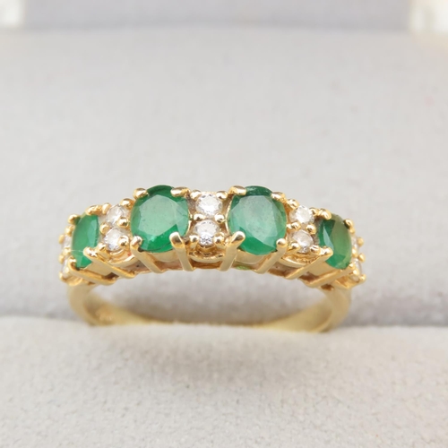 110 - Emerald and Diamond Four Stone Ring Mounted on 18 Carat Yellow Gold Band Ring Size O and a Half