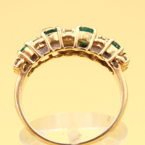 110 - Emerald and Diamond Four Stone Ring Mounted on 18 Carat Yellow Gold Band Ring Size O and a Half