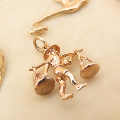 116 - Three 9 Carat Yellow Gold Pendants or Charms Including Figural Example