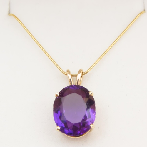 119 - Amethyst 9 Carat Yellow Gold Mounted Pendant Four Claw Set Further Mounted on 9 Carat Yellow Gold Ch... 