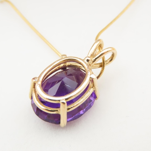 119 - Amethyst 9 Carat Yellow Gold Mounted Pendant Four Claw Set Further Mounted on 9 Carat Yellow Gold Ch... 