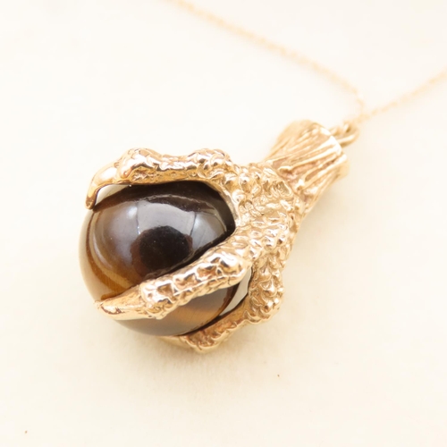 120 - 9 Carat Yellow Gold Tigers Eye Pendant Dragon Claw Set Mounted on 9 Carat Yellow Gold Chain Pendant ... 