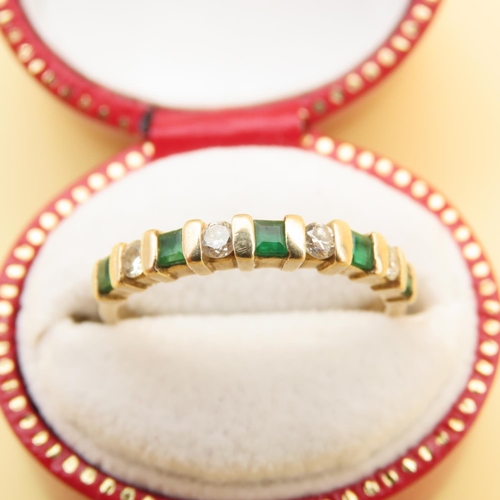 124 - Emerald and Diamond Half Eternity Ring Mounted on 14 Carat Yellow Gold Band Ring Size L