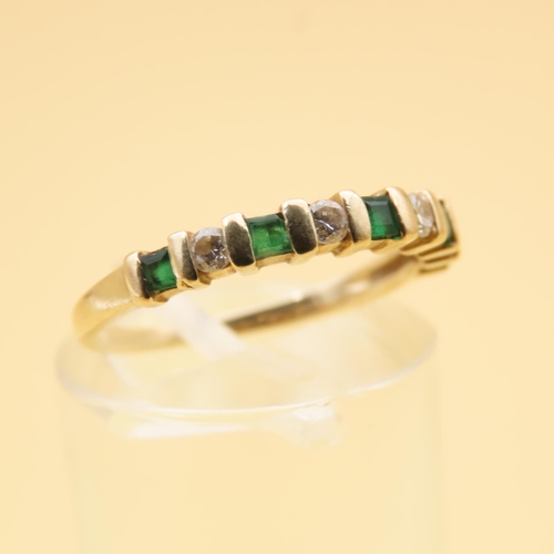 124 - Emerald and Diamond Half Eternity Ring Mounted on 14 Carat Yellow Gold Band Ring Size L