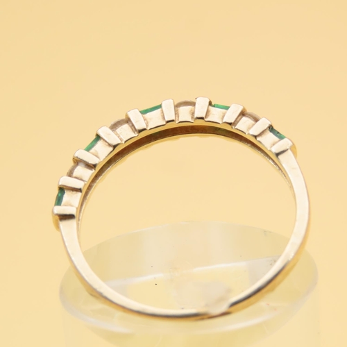 124 - Emerald and Diamond Half Eternity Ring Mounted on 14 Carat Yellow Gold Band Ring Size L