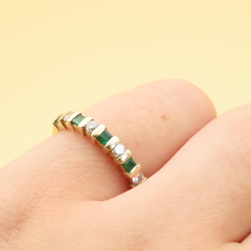 124 - Emerald and Diamond Half Eternity Ring Mounted on 14 Carat Yellow Gold Band Ring Size L