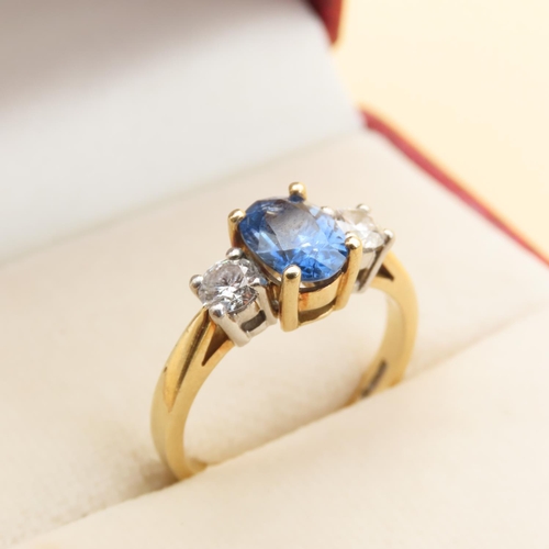 26 - Sapphire and Diamond Three Stone Ring Centerstone Four Claw Set Mounted on 18 Carat Yellow Gold Band... 