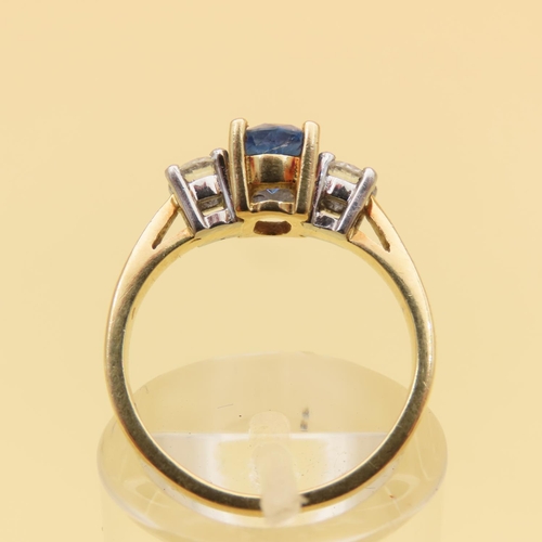 26 - Sapphire and Diamond Three Stone Ring Centerstone Four Claw Set Mounted on 18 Carat Yellow Gold Band... 