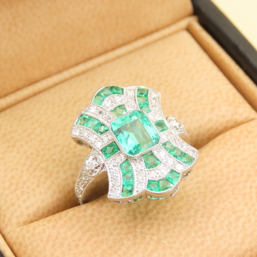Emerald and Diamond Ladies Ring Attractively Detailed Mounted on Platinum with Further Diamond Decorated Shoulders Band Size N