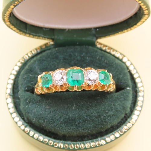 28 - Emerald and Diamond Five Stone Ring Mounted on 18 Carat Yellow Gold Band Ring Size N and a Half