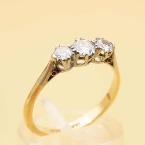 4 - Three Stone Diamond Ring Mounted on 18 Carat Yellow Gold Band Ring Size N
